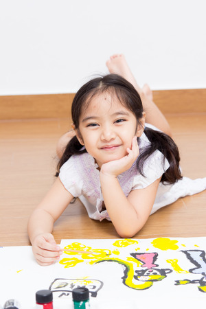 Little Asian artist child drawing and painting の写真素材