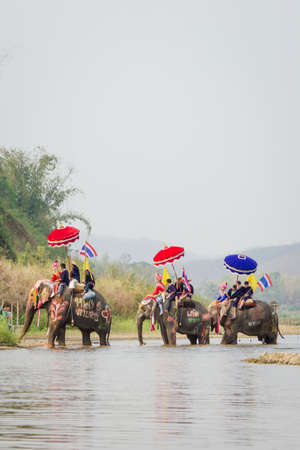 SUKHOTHAI, THAILAND - April 7   Unidentified people in tradition of the Sri Satchanalai district for ordaining a whole group of new monks with elephants on April 7, 2014 in Sukhothai, Thailand のeditorial素材