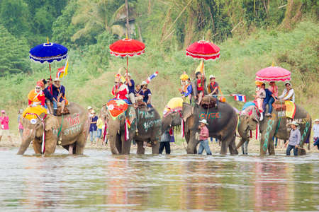SUKHOTHAI, THAILAND - April 7   Unidentified people in tradition of the Sri Satchanalai district for ordaining a whole group of new monks with elephants on April 7, 2014 in Sukhothai, Thailand のeditorial素材
