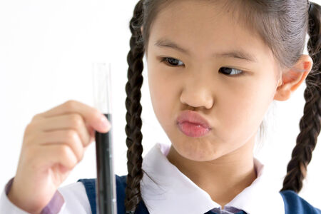 Asian student making science experimentsの写真素材