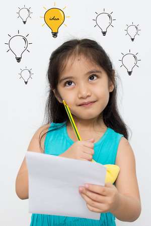 Little Asian girl has many ideaの写真素材