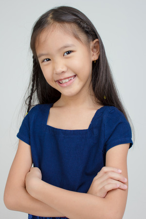 Portrait of happy little Asian childの写真素材