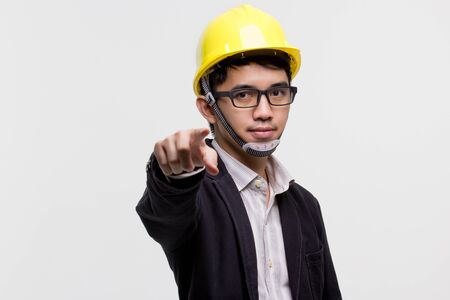 Portrait of confident Asian engineer on isolated backgroundの写真素材