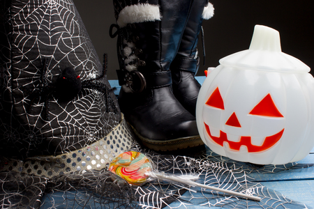 Pumpkin bucket, witch's hat and boots, Halloween decorationsの写真素材