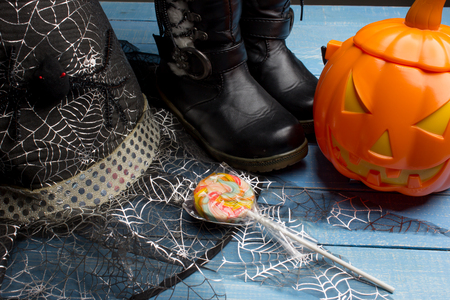 Pumpkin bucket, witch's hat and boots, Halloween decorationsの写真素材