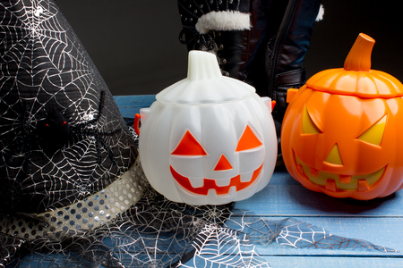 Pumpkin bucket, witch's hat and boots, Halloween decorationsの写真素材