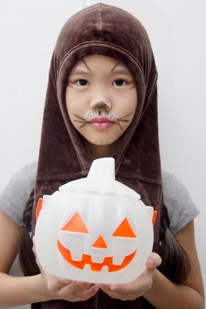 Portrait of cute girl in Halloween costume looking at cameraPortrait of cute girl in Halloween costume looking at cameraの写真素材