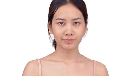 Comparison face of beautiful Asian young woman before and after make up. Development of skin repairing and retouching concept.の写真素材