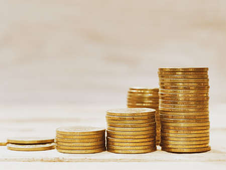 stack of money, rows of coins for finance and banking conceptの写真素材