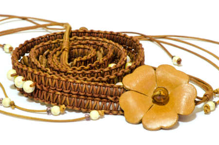 fashion crochet brown belt female with flower isolated on white backgroundの写真素材