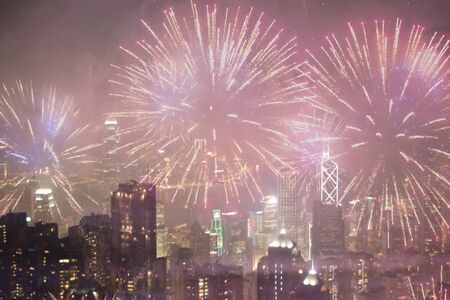 Abstract of blur city night view with fireworksの写真素材