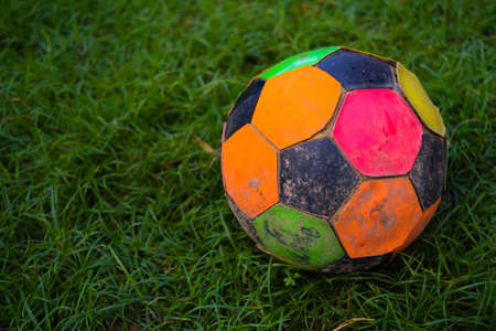 football on green grassの写真素材