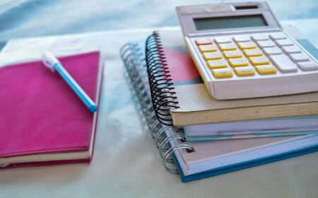 many book and calculatorの写真素材