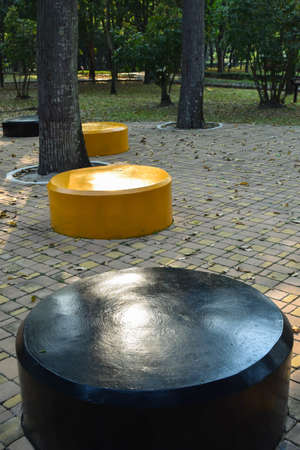 Chair in the garden black and yellow colorの写真素材