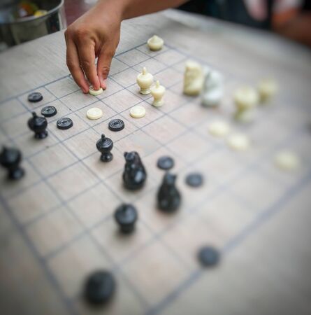 chess game on board show handの写真素材