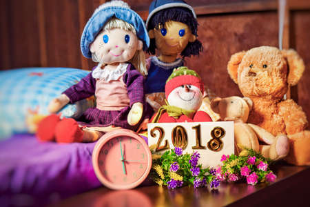 alarm clock in morning and teddy bearの写真素材