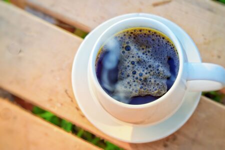 morning coffee cup garden backgroundの写真素材