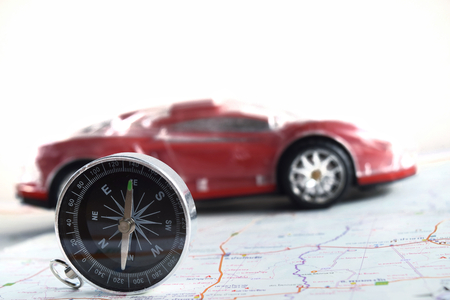 car on world figure travel conceptの写真素材