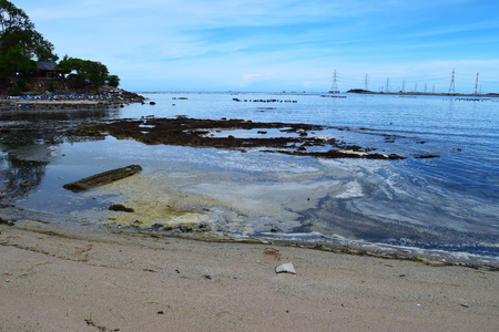 dirty sea industrial areaの写真素材