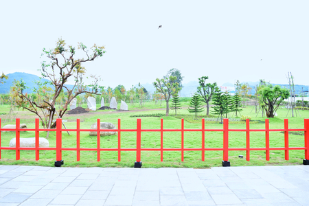 red wood fence in parkの写真素材