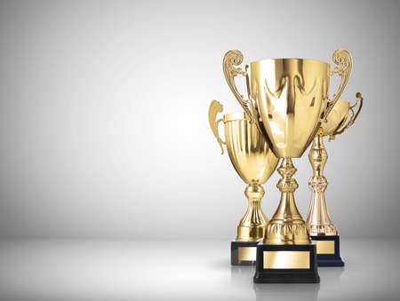 golden trophies on gray backgroundの写真素材