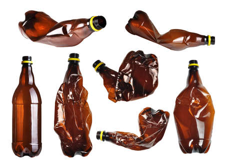 Collection of brown plastic bottles isolated on white の写真素材