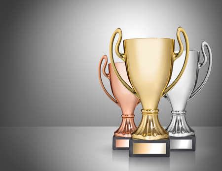 champion trophies on grey backgroundの写真素材