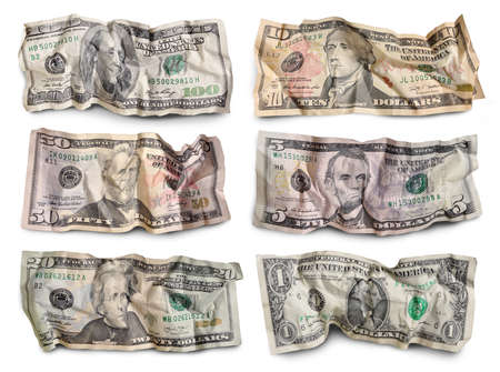 Set of crumpled dollar bills against white backgroundの写真素材