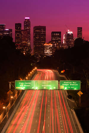 Los Angeles sunset highway traffic skylineの写真素材