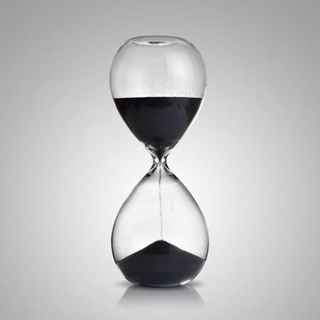 hourglass on gray backgroundの写真素材