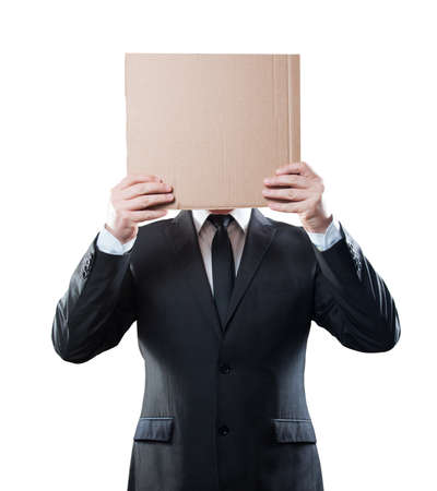 Businessman holding cardboard on white background. Clipping pathの写真素材