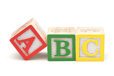 Wooden alphabet blocks isolated on white backgroundの写真素材