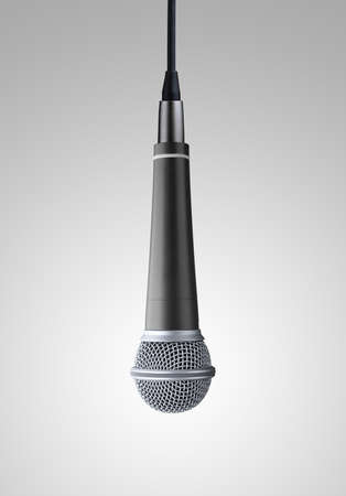 upside down microphone on gray backgroundの写真素材