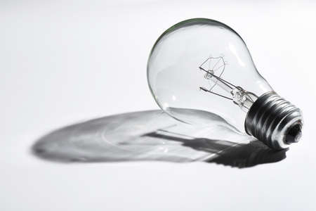 light bulb with shadow on the floor