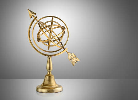 Vintage armillary sphere on gray backgroundの写真素材