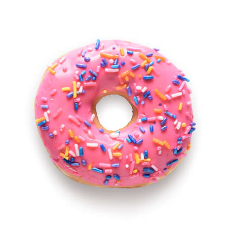 Pink frosted donut with colorful sprinkles isolated on white background. Include clipping pathの写真素材