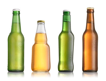 Collection of full beer bottles with no labels isolated on white backgroundの写真素材