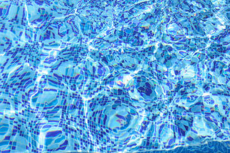 Beautiful refreshing blue swimming pool waterの写真素材
