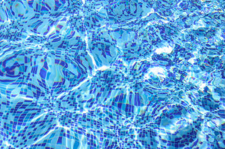 Beautiful refreshing blue swimming pool waterの写真素材