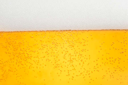 close up beer with foam and bubblesの写真素材