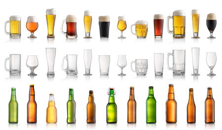 Set of different beer bottles and glasses isolated on white backgroundの写真素材