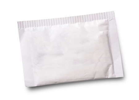 Small sugar packet isolated on whiteの写真素材