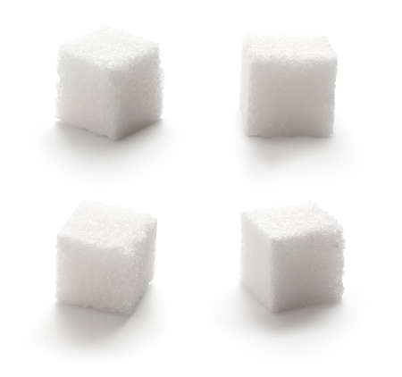 Collection of sugar cubes on white backgroundの写真素材