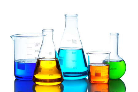 Laboratory glassware set with color liquid and reflection. Isolated on white backgroundの写真素材