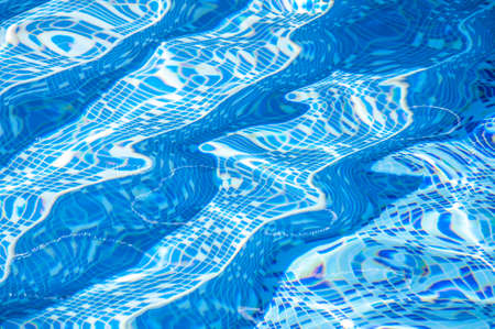 Beautiful refreshing blue swimming pool water の写真素材