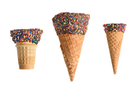 Collection of ice cream cones with chocolate and sprinkles isolated on white backgroundの写真素材