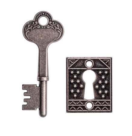 Old key and keyhole isolated on white backgroundの写真素材