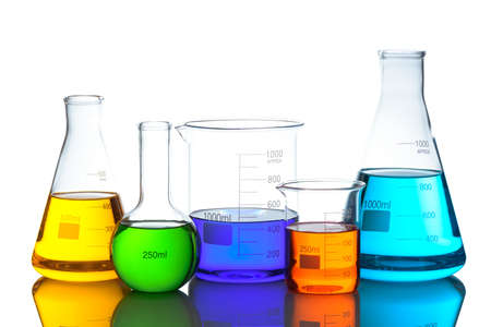 Laboratory glassware set with color liquid and reflection. Isolated on white backgroundの写真素材