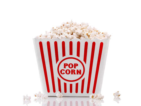 Red and white popcorn box isolated on white backgroundの写真素材