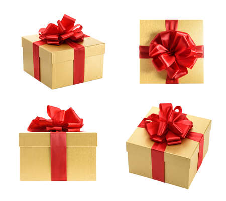 Golden gift box collection isolated on a white backgroundの写真素材